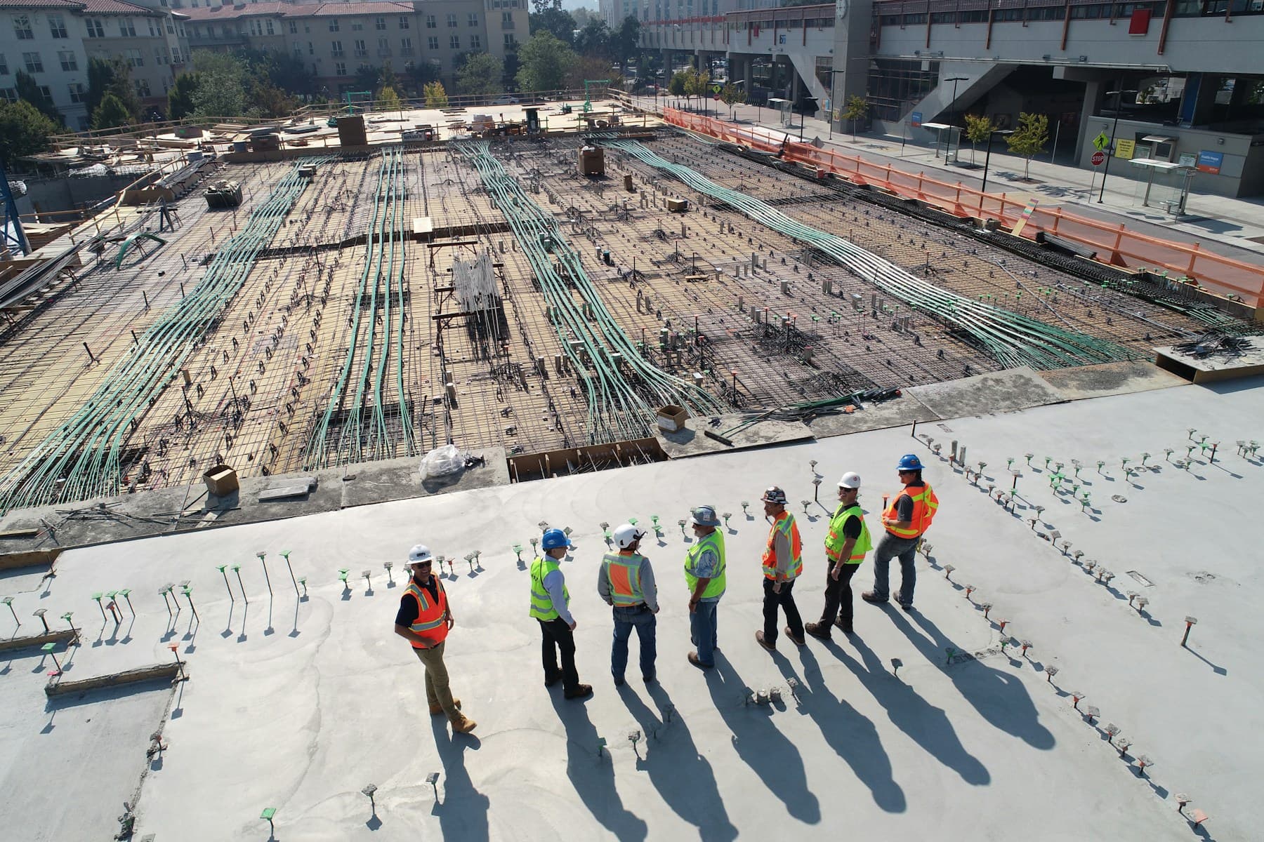 Construction professionals working together on a large project
