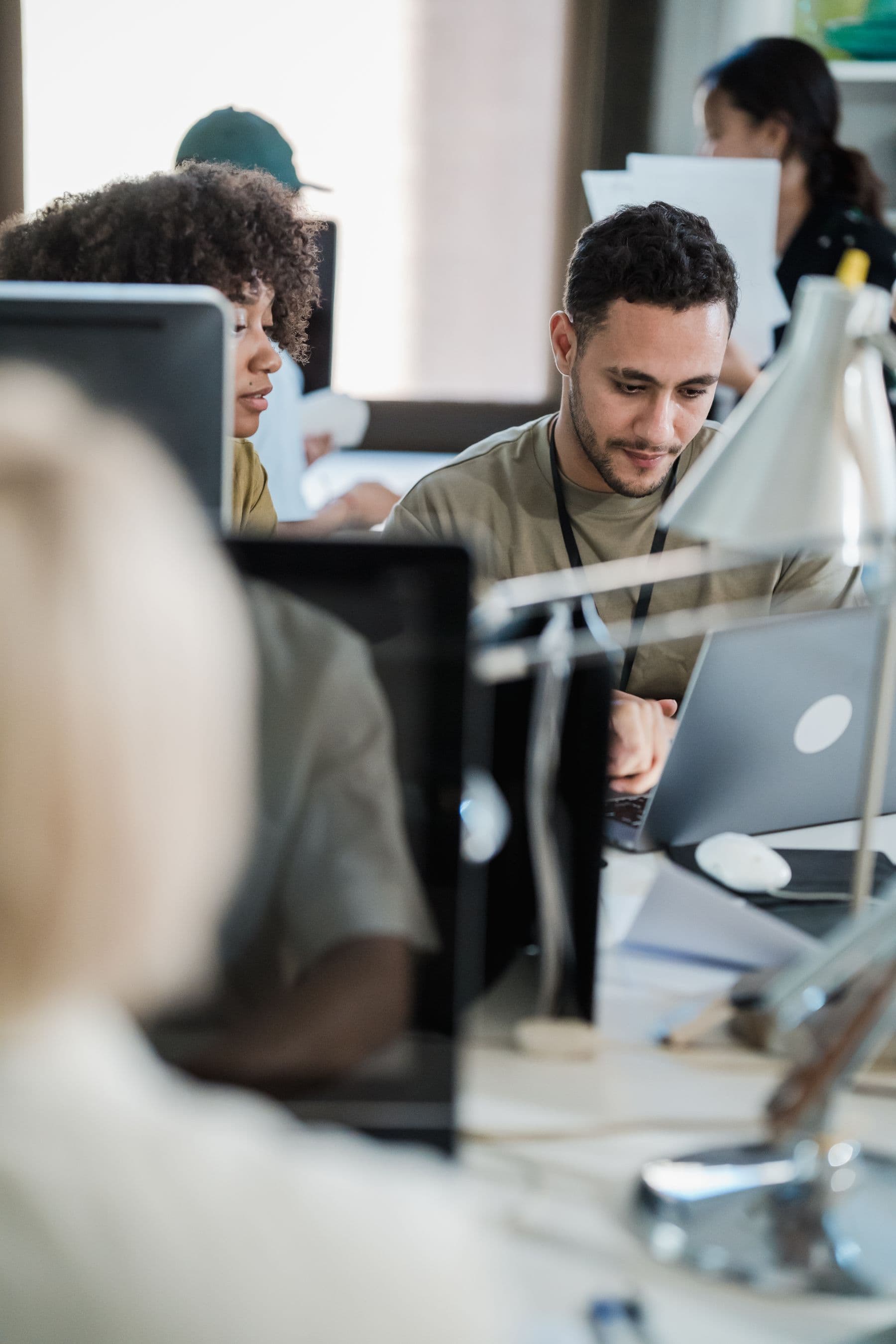 Skilled professionals collaborating in a modern office